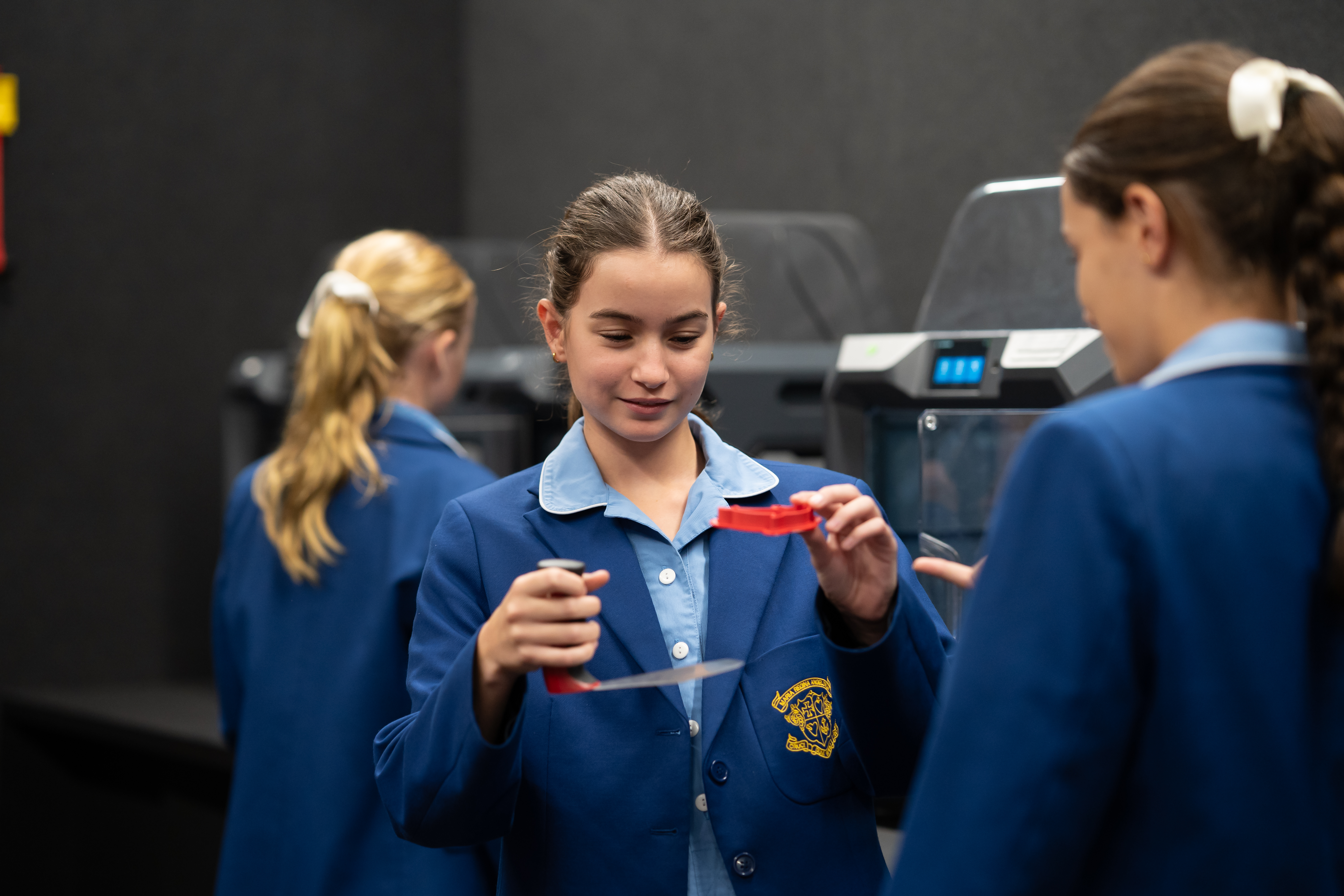 Student using 3D printer
