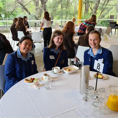 Khanh, Jemima, and Clare at the celebration event at the conclusion of the Program